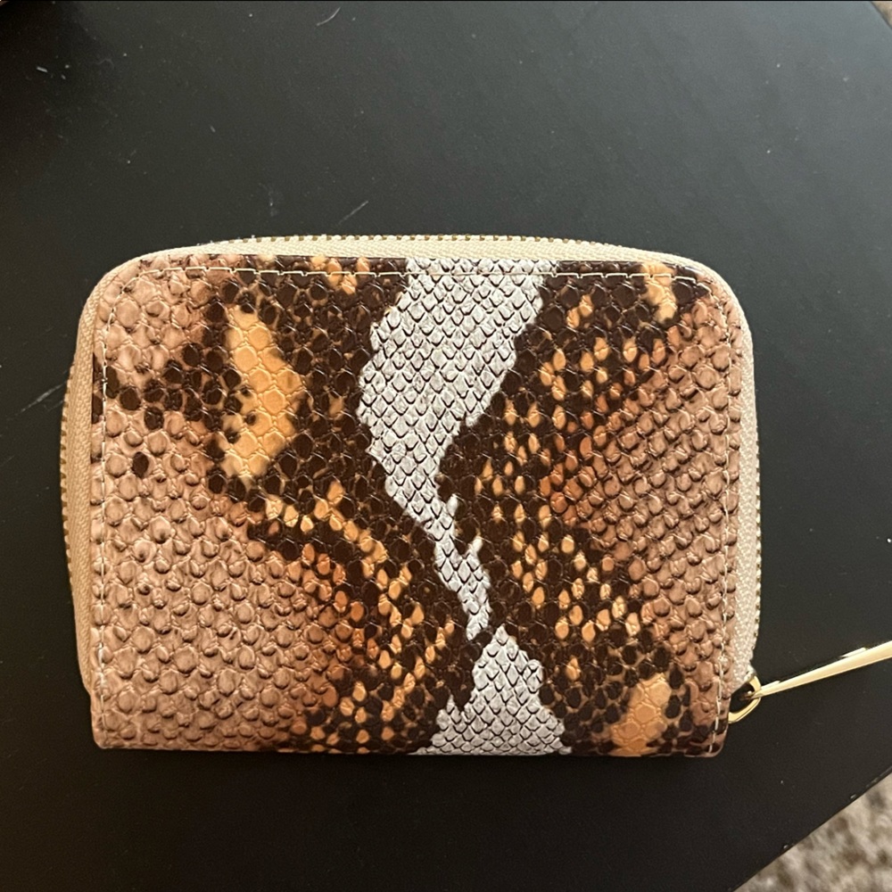 4.5”x3.25” dark salmon orange white fake snake material.